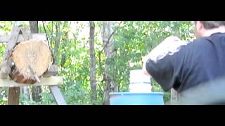Slow motion knife and tomahawk throw