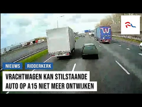 Motorpech zet auto stil op A15, een vrachtwagen kan hem niet meer ontwijken