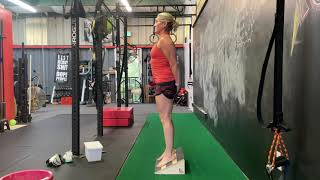 Slant Board Hack Squat: Arms Behind Body
