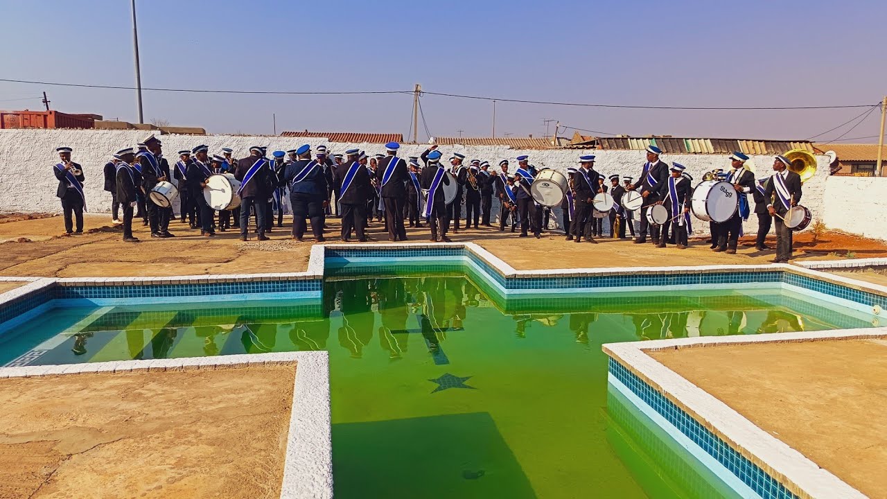 9:30 am Band parade at Mzoxolo International HQ