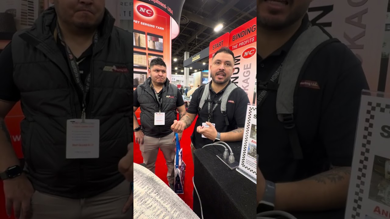 NC Carpet Binding team coaching up a client who's never bound rugs! Live at Surfaces 2025