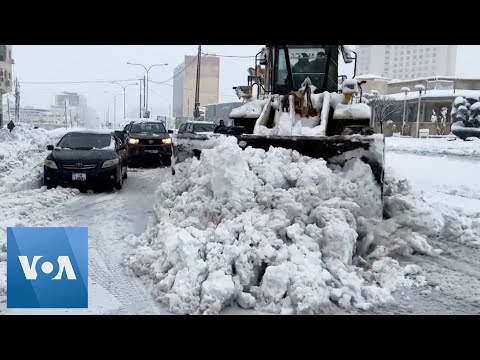 Storm Blankets Jordan in Snow