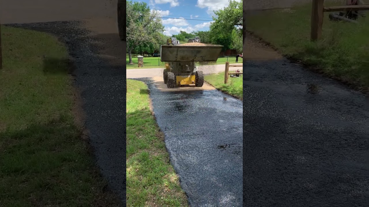 Chip sealing old asphalt driveway.   Affordable asphalt paving 512-364-5615
