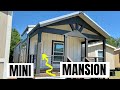 Tiny house they call the "MINI MANSION!" Remarkable setup on this cottage type home! Tiny House Tour