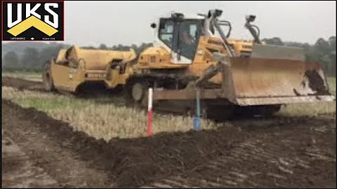 Liebherr PR 736 & Scraper