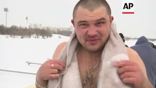 Russians take icy dip to mark Epiphany