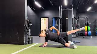 Modified side plank with leg raises