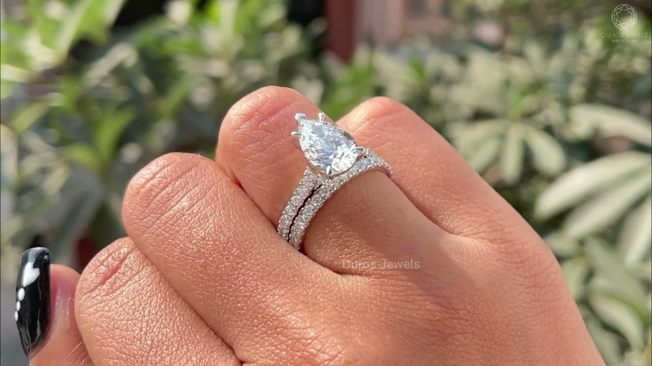 Pear Cut Solitaire Accent Bridal Ring Set 