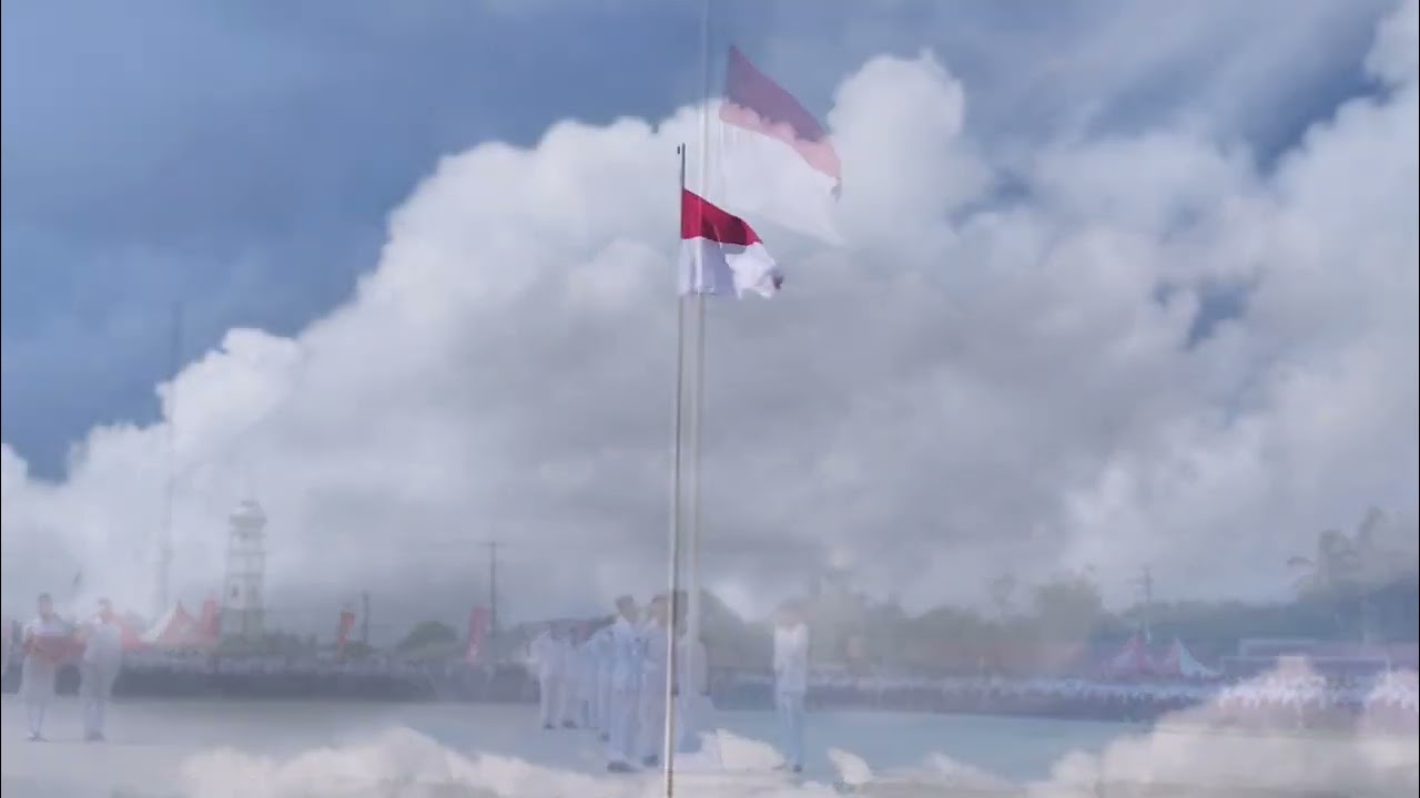 UPACARA PENAIKAN DAN PENURUNAN BENDERA MERAH PUTIH DI BELINYU