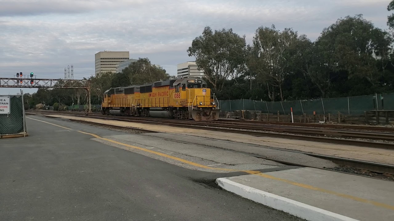 Caltrain 911 rushes past South San Francisco station in CA with an ...