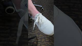 Restless Leg Syndrome wearing Keds leather sneakers