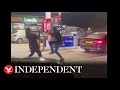 Frustrated customers fight on Esso forecourt amid UK fuel crisis