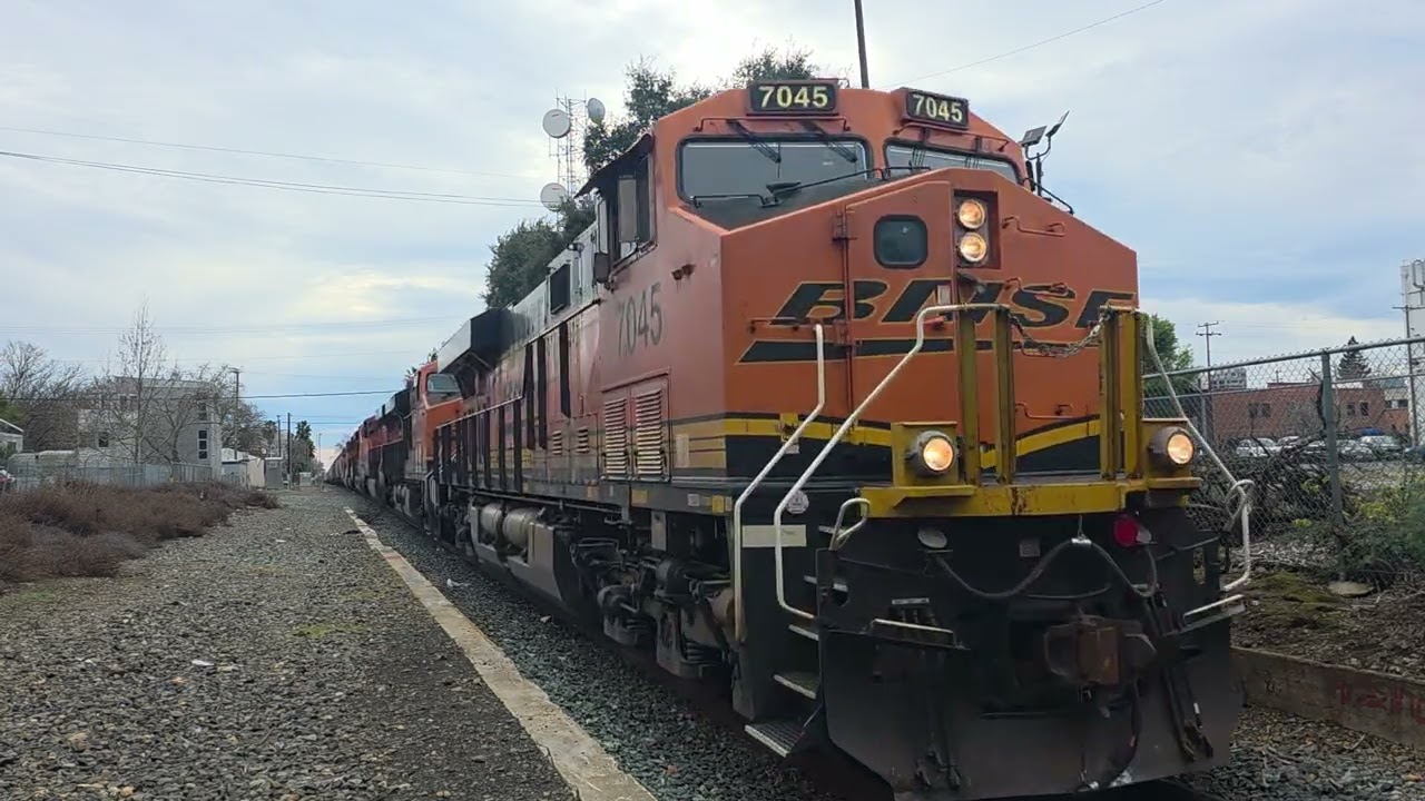 BNSF 7045 leads a grain train with BNSF 618 in Sacramento, CA