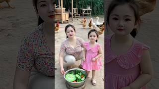 Beautiful Pregnant Mom Shows Baby Bump To Daughter In The Yard