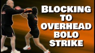Blocking to overhead bolo strike