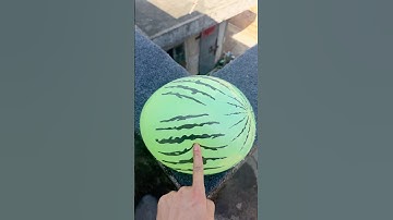Experiment: Will a water balloon explode if it rolls down a tall building? 💥🎈 #balloon