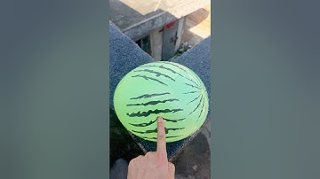 Experiment: Will a water balloon explode if it rolls down a tall building? 💥🎈 #balloon