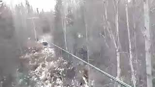 Working off pole in Tyonek, Alaska lashing fiber optic cable
