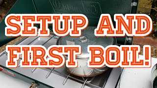 Set up first burn and first boil on a Coleman classic two burner camp stove.