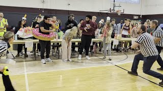 The final round of the donut-eating contest at Moline High School