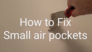 How to fix tiny air pockets in drywall repair