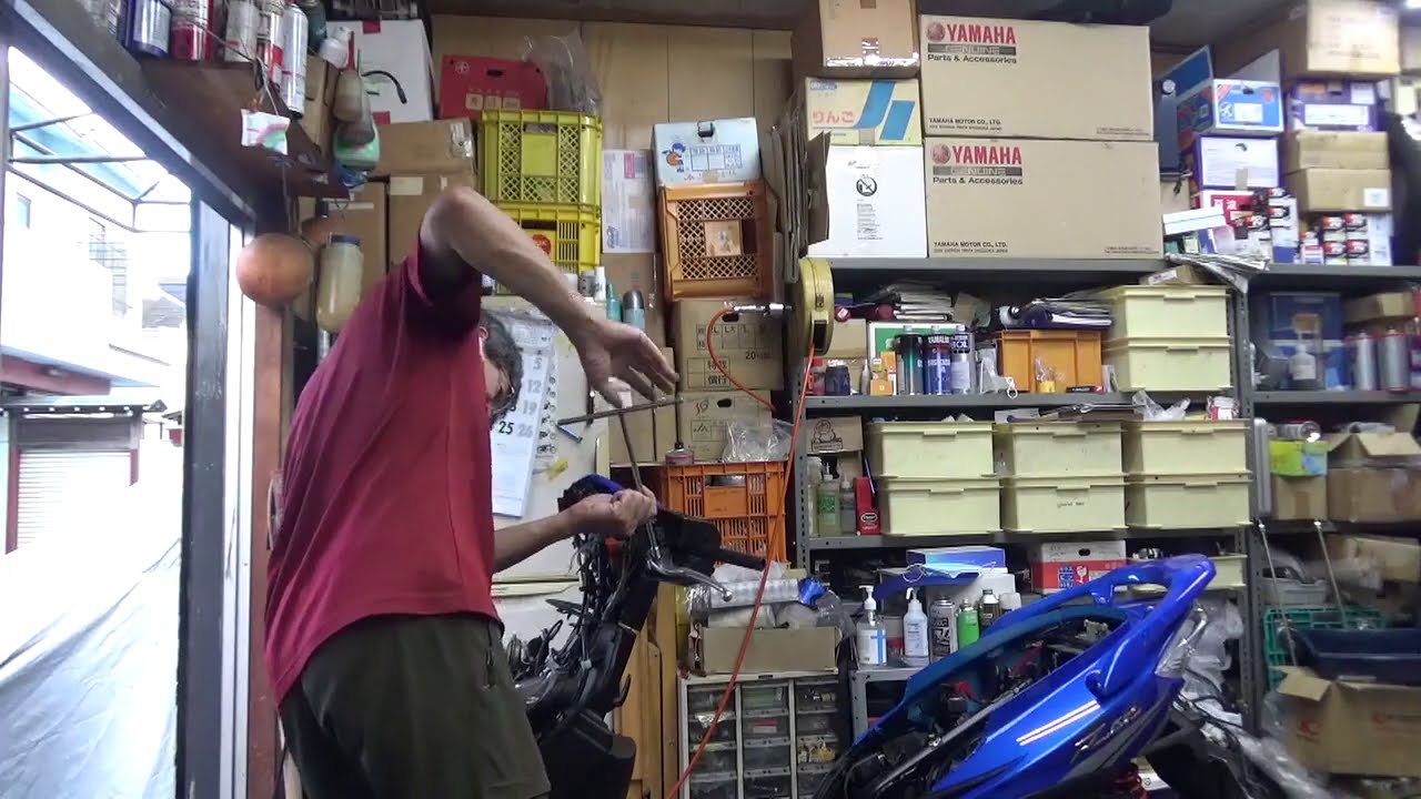 Evening at the motorcycle shop. Racing King 180. Replacing the