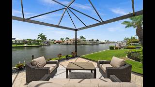 Intersecting 200’ Wide Canal Views! Cape Coral Pool Home With 5+ Car Mancave Garage | 105 SW 52nd St