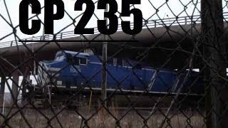 CEFX 1006 leads stack/autorck through McDougall, ON (CP 235)