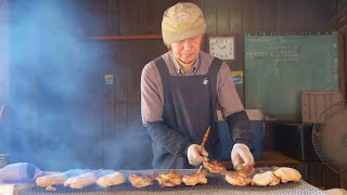 Delicious grilled chicken thighs at a food stall deep in the mountains! japanese street food. 屋台