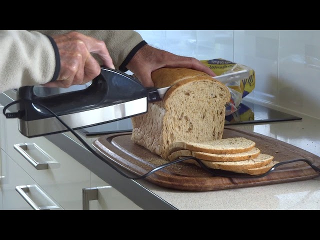 electric knife cutting bread or frozen