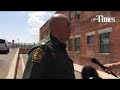 Agent Joe Romero updates the search for a possible weapon used to kill two Mexican officers in the r