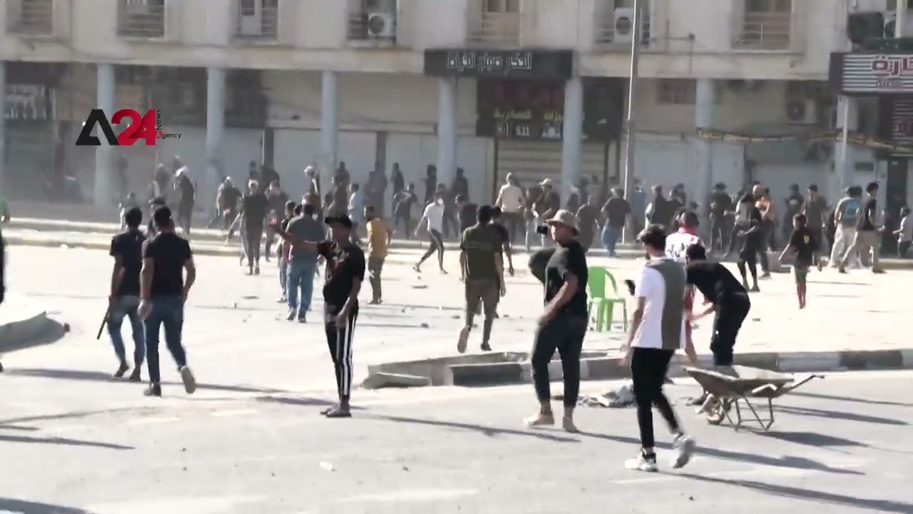 Iraq-Protesters injured in clashes with security forces