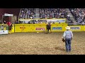 Kolt Dement competes in bronc riding at the CNRF