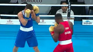 Boxe. David Tshama (RDC rouge) contre Pavel Sosulin (Russie bleu)