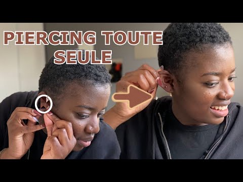Vidéo: Façons simples de fermer un piercing au lobe d'oreille : 8 étapes (avec photos)
