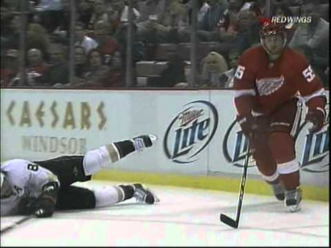 Niklas Kronwall cranks Teemu Selanne