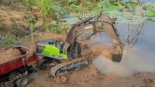 How to operate mini excavator 1593 | Excavator remote control clearing sand for building road P2