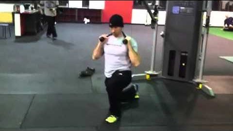 TonyGentilcore.com Half Kneeling Vertical Pallof Press