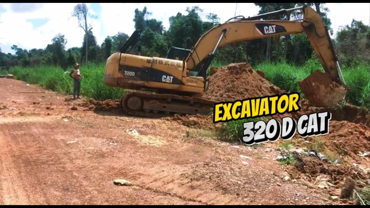 Excavator 320D dig soil to construction way water - YouTube