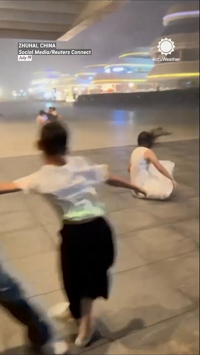 Intense Winds Knock Down People As Typhoon Wipha Hits China