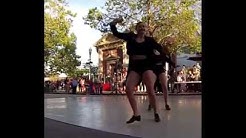 Young lady dancers performing a tap dance on the street.