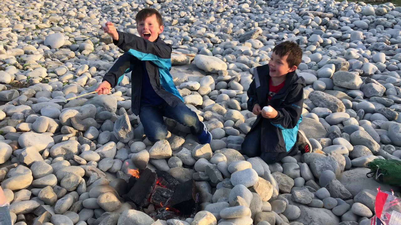 Roasting marshmallows on the beach