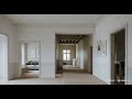 an unfinished apartment to generate a fully renovated video