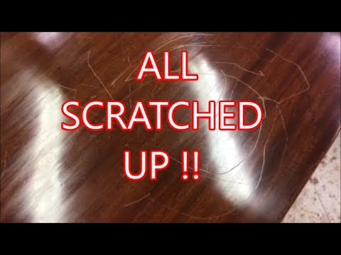 REPAIRING SCRATCHES ON A TABLE TOP