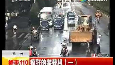 Shocking footage has emerged from China of a bulldozer driver crashing into cars and people delibera