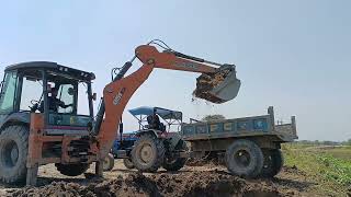 JCB 3DX BACKHOE LOADING MUD IN TRACTOR SONALIKA SIKANDER