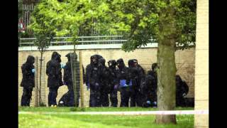 Headline: Police call London hacking death of soldier an apparent terrorist attack