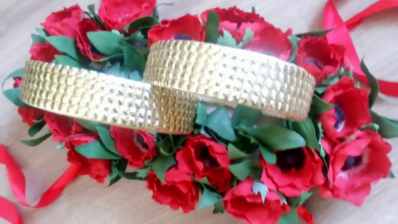 Цветочное украшение кольца на свадебную машину