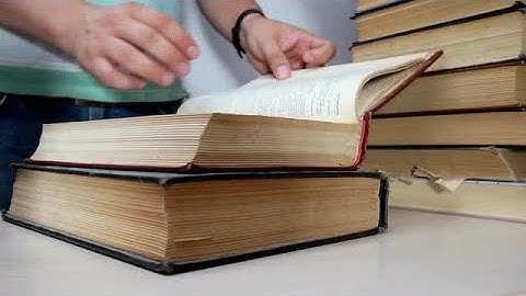 Browsing Old Books Stock Video