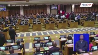 Hard hats fly, fists thrown as EFF removed from Parliament